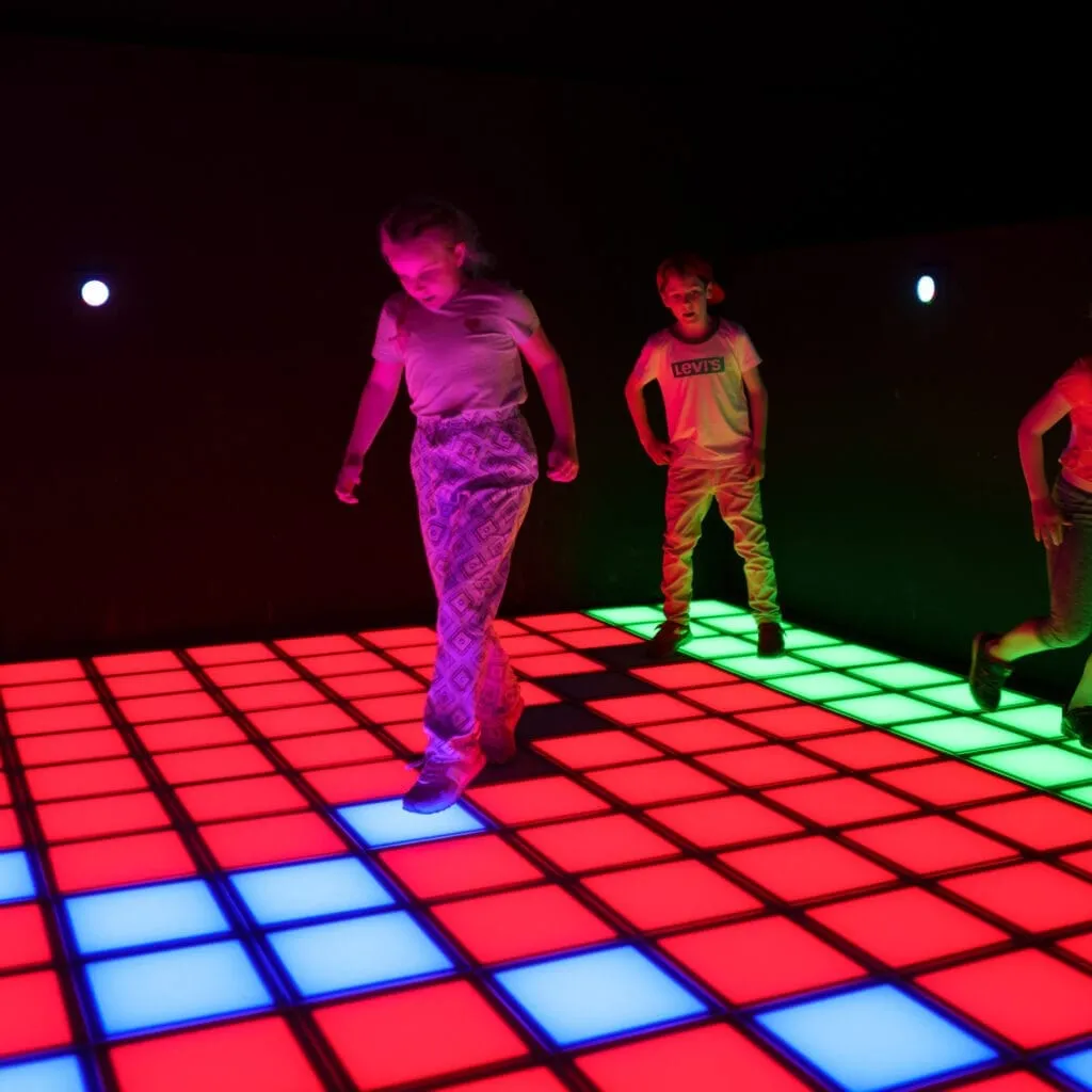 Kids enjoying Pixel interactive floor game