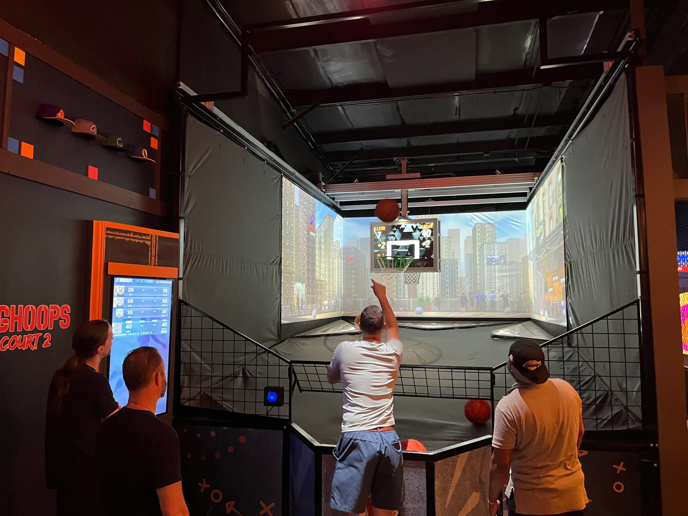 A moving robotic hoop in play at Electric Sports Social